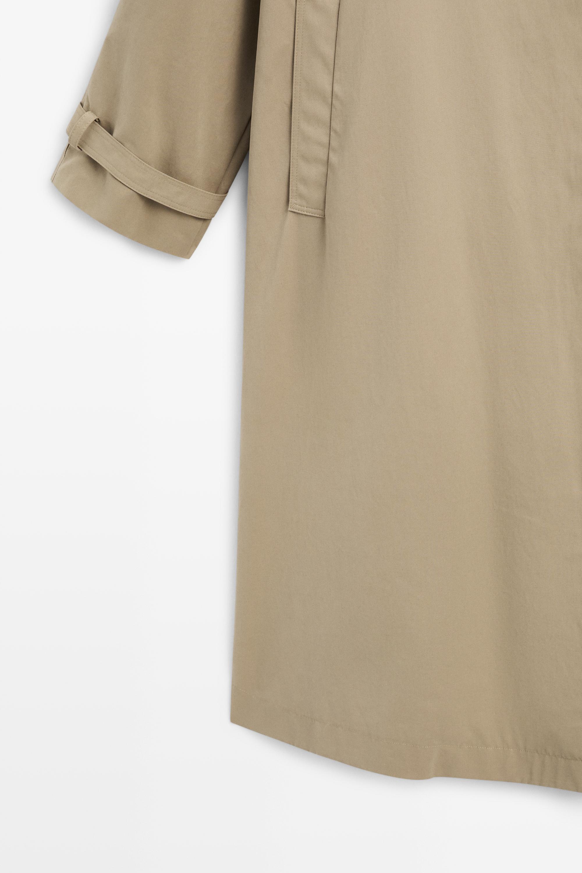 Long buckle-detail trench coat